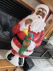 black blow mold santa manufacturing